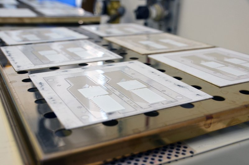 The displays are printed one layer at a time on films. They must be left to dry between each step.