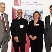 Hochschulpräsident Prof. Dr. Karl Stoffel mit den Referenten Peter Schneider (FutureCamp Holding GmbH, München) und Prof. Andra Badura sowie Prof. Dr. Markus Schmitt (beide Hochschule Landshut)